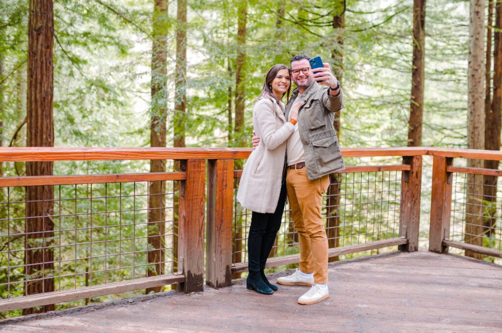 Engaged couple taking selfie
