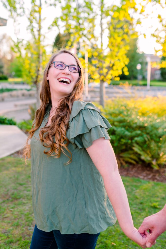 Beautiful bride to be smiling at fiance