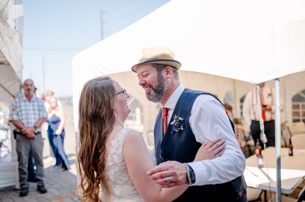 Bride and groom looking at each other during their first dance at their Oregon Wedding