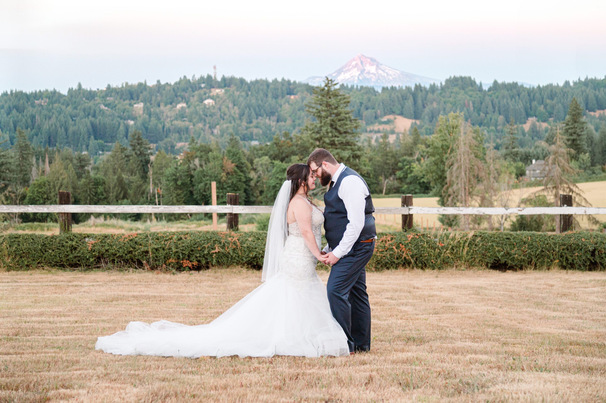 Bride and groom in front of Mt. Hood at East Fork Country Estate in Damascus Oregon